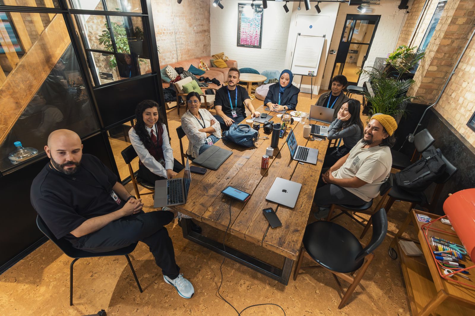 Diverse team collaborating on social impact work